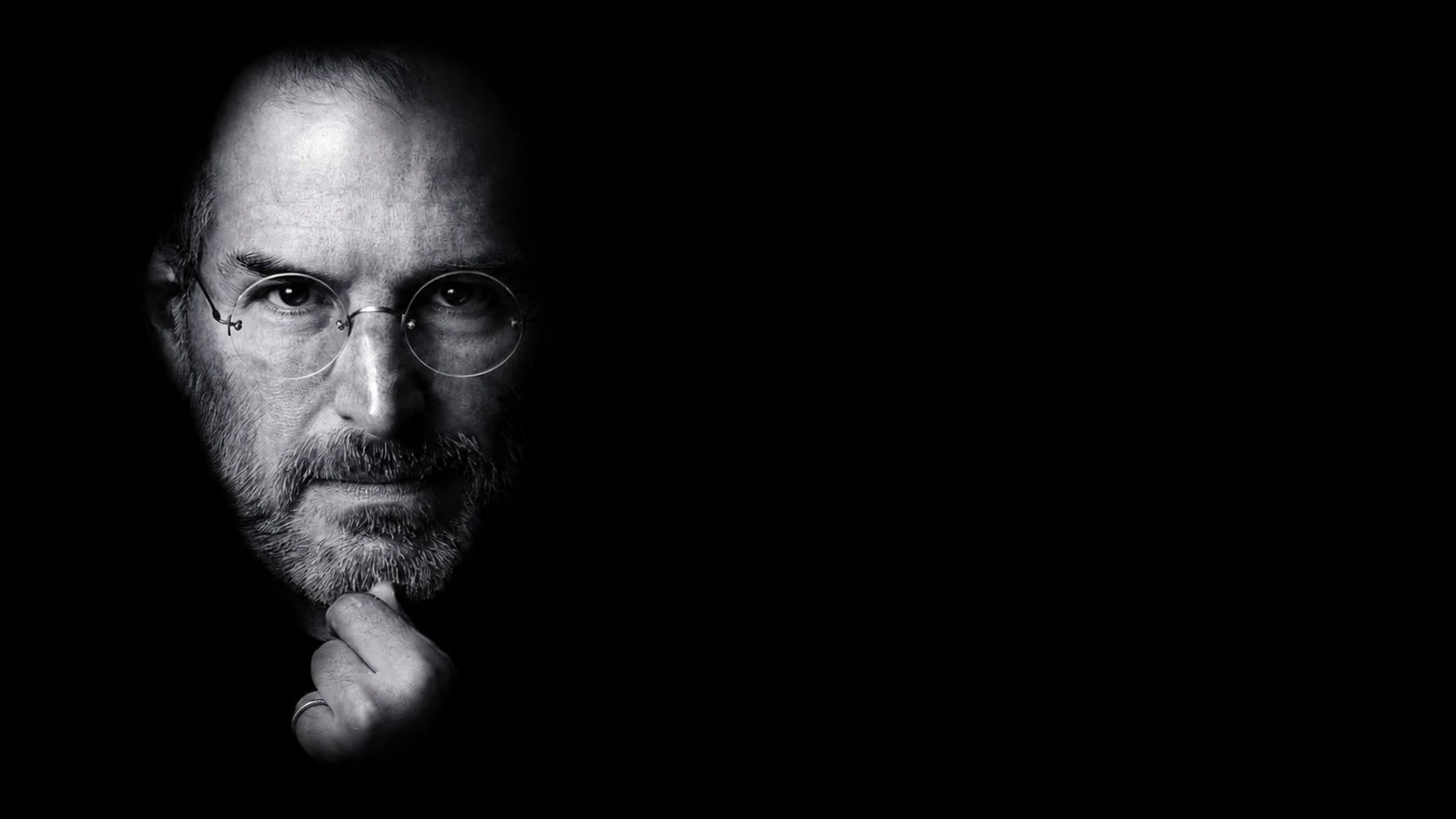Black-and-white portrait of Steve Jobs